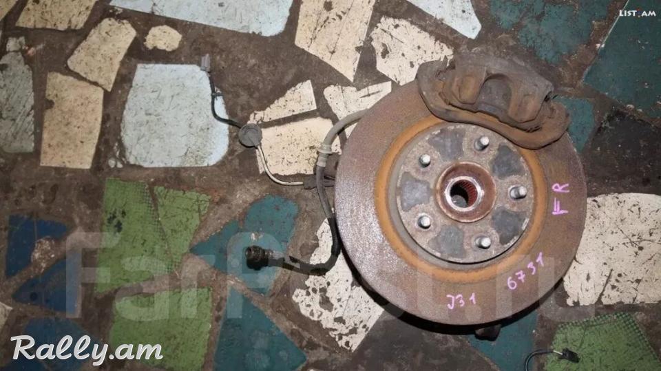 Nissan Tiida tarmaznoy tarelka