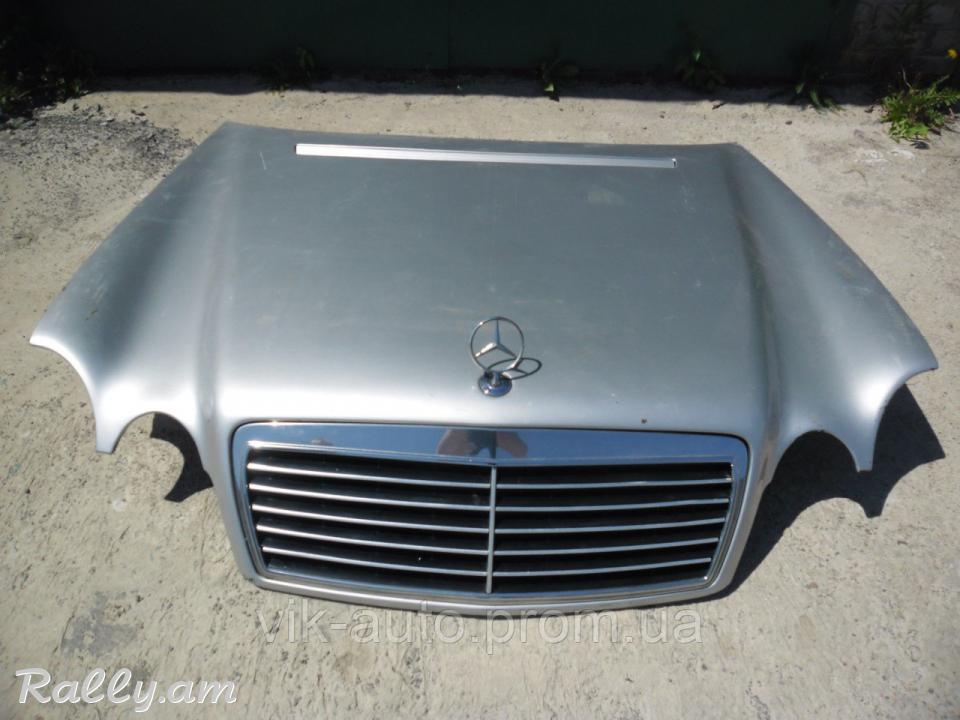 W210 կապոտ