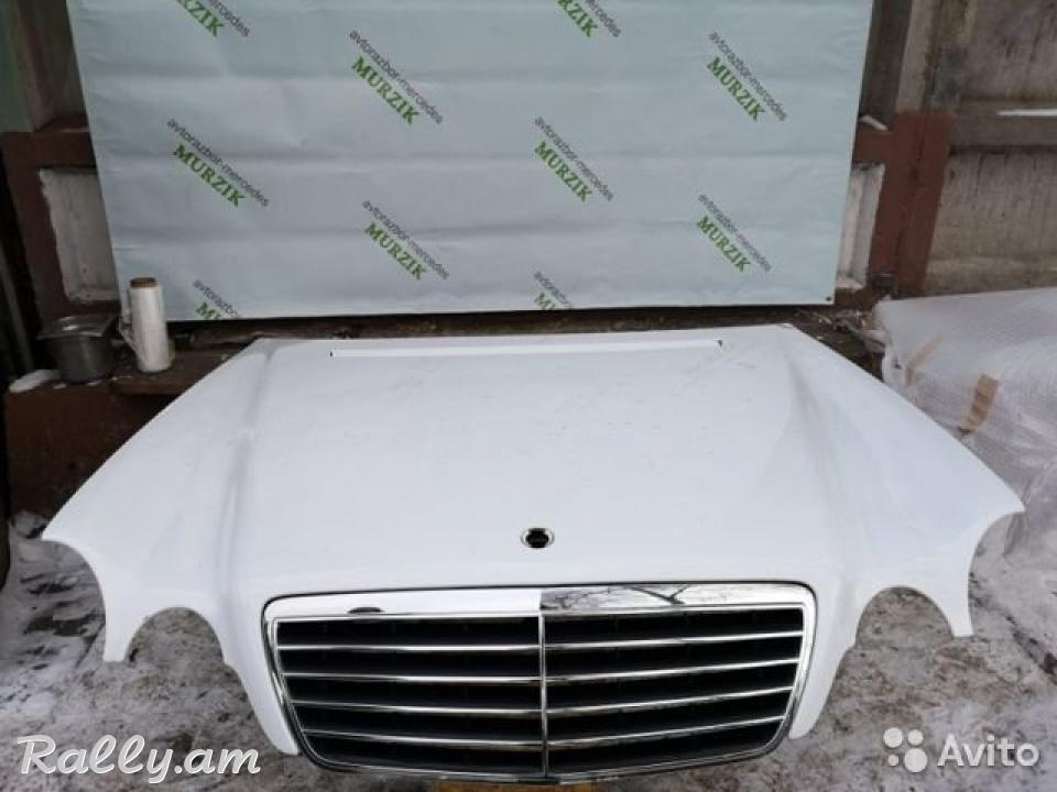 W210 կապոտ