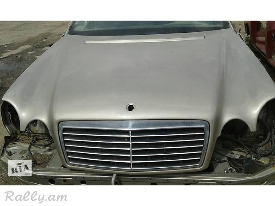 W210 կապոտ