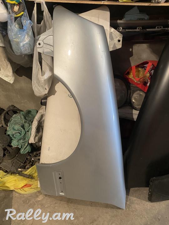 W210 krilo